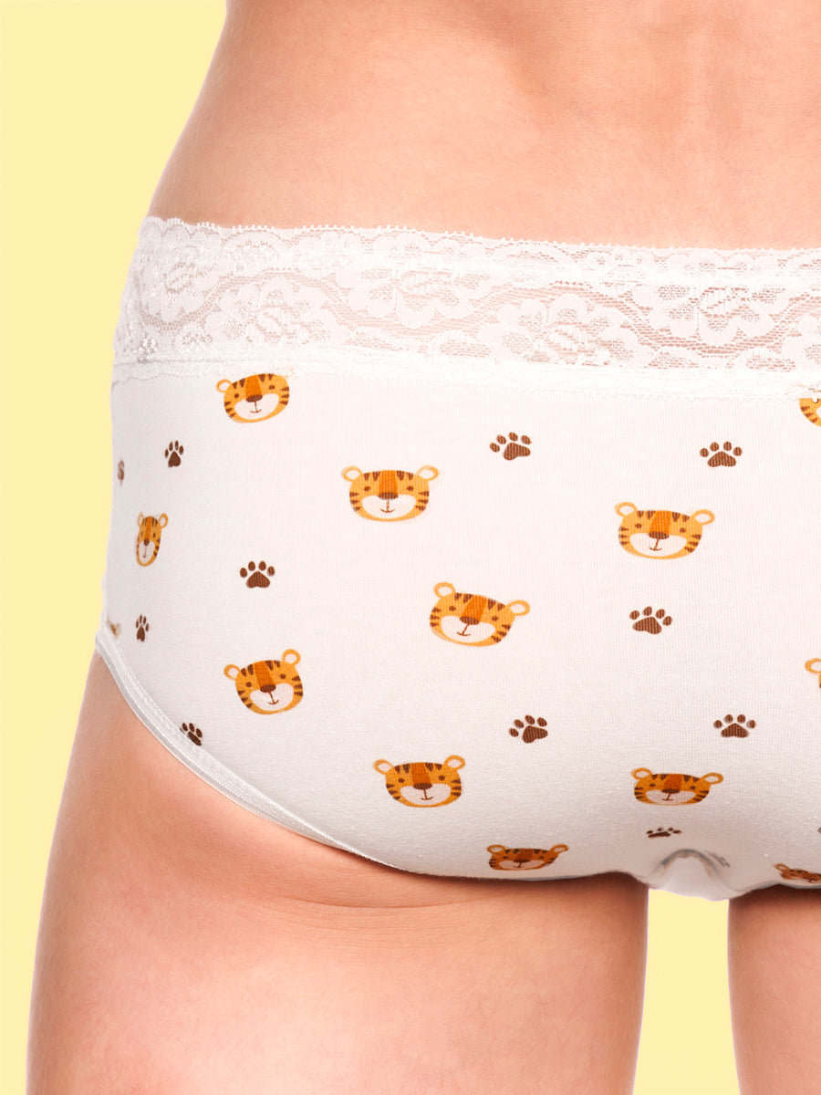 Closeup back shot of a man wearing white XDress panties with a tiger pattern