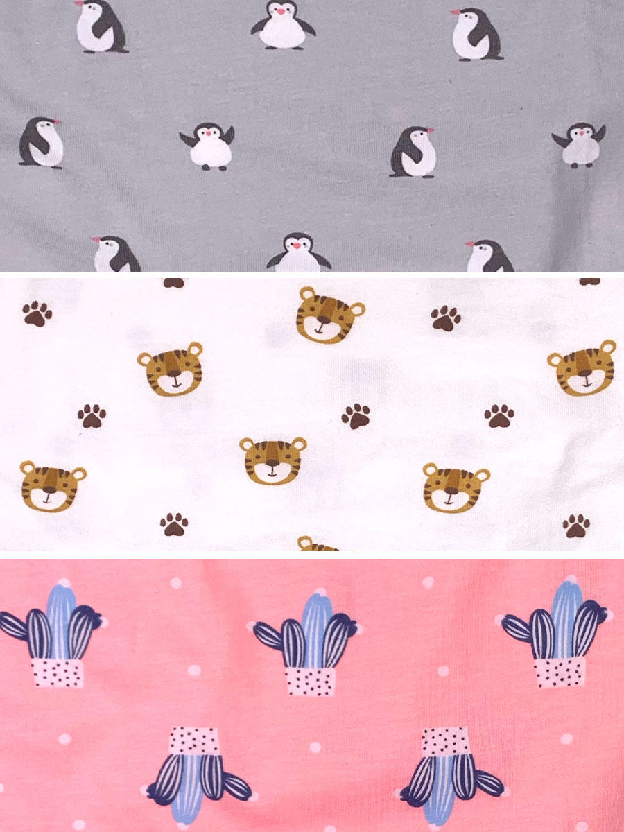 Closeup view of three men's XDress panties with different playful designs in grey, white, and pink