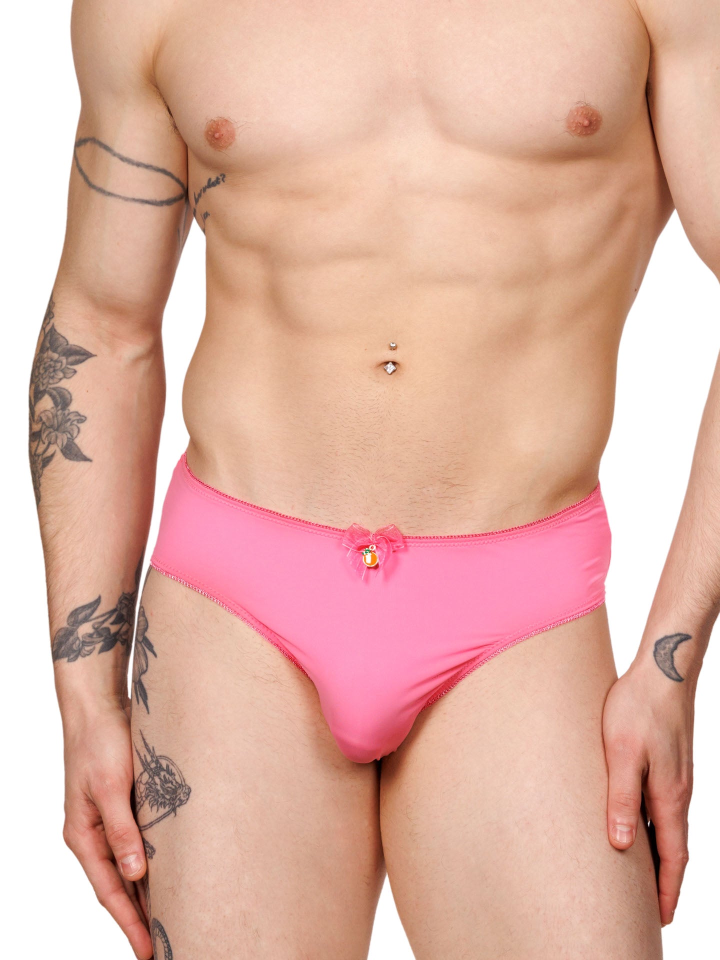 Front view of a male model wearing pink hipster panties with lace trim and a matching pink bow.