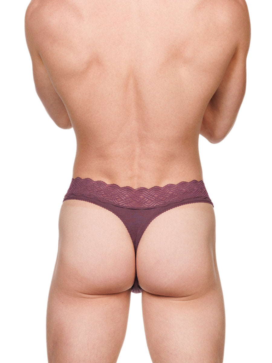 Back view of a male model wearing a burgundy red XDress cotton thong with a matching lace waistband