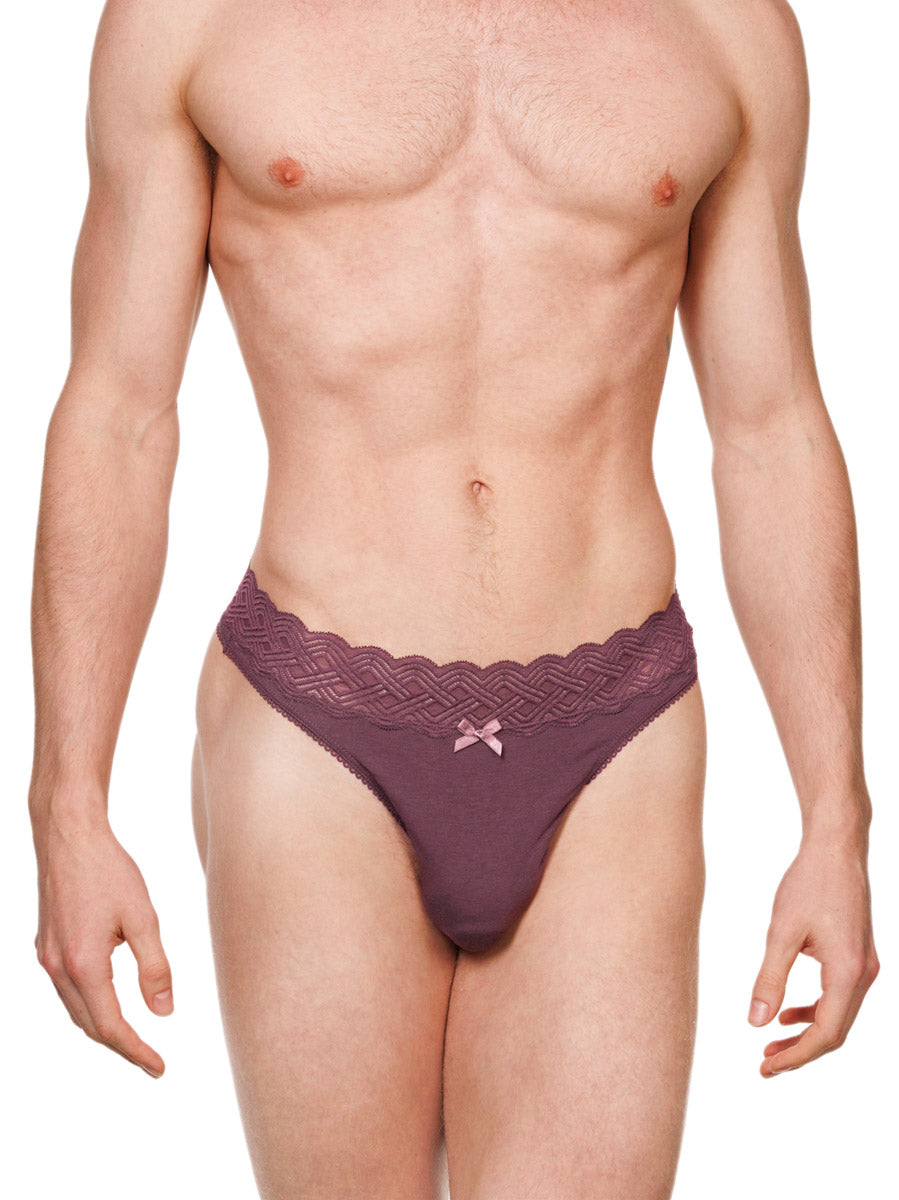 Front view of a male model wearing a burgundy red XDress cotton thong with a matching lace waistband