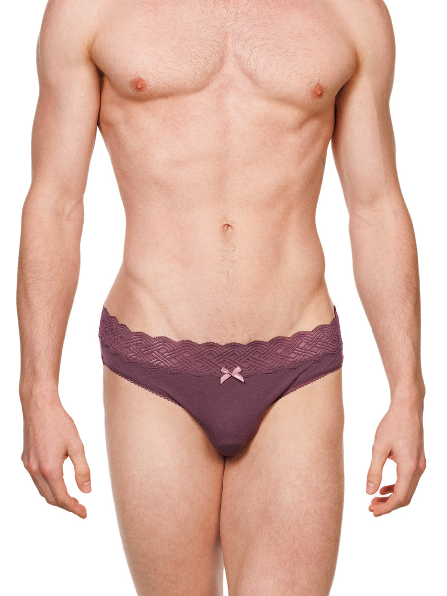 Front view of a male model wearing burgundy red XDress cotton panties with a lace waistband