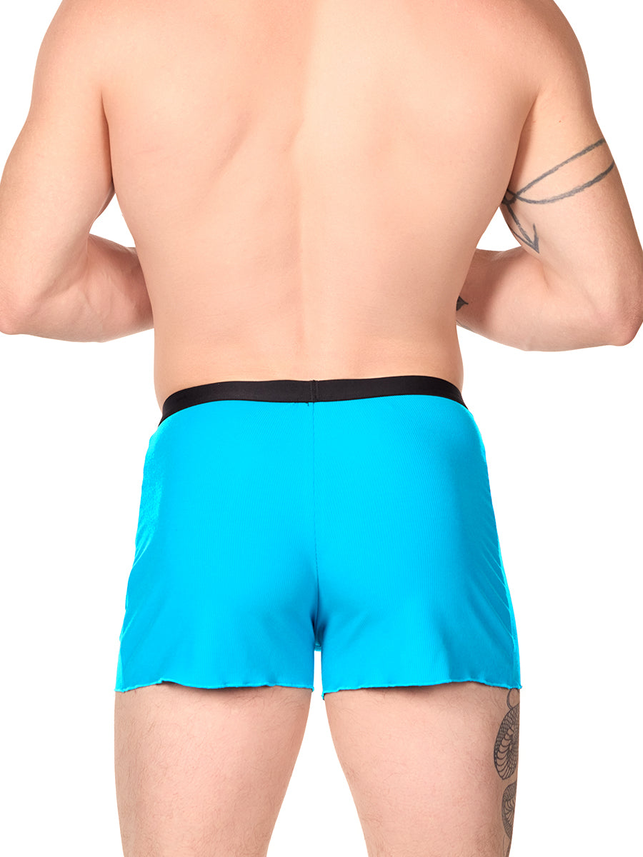 Back view of a man wearing turquoise XDress lounge shorts with black waistband