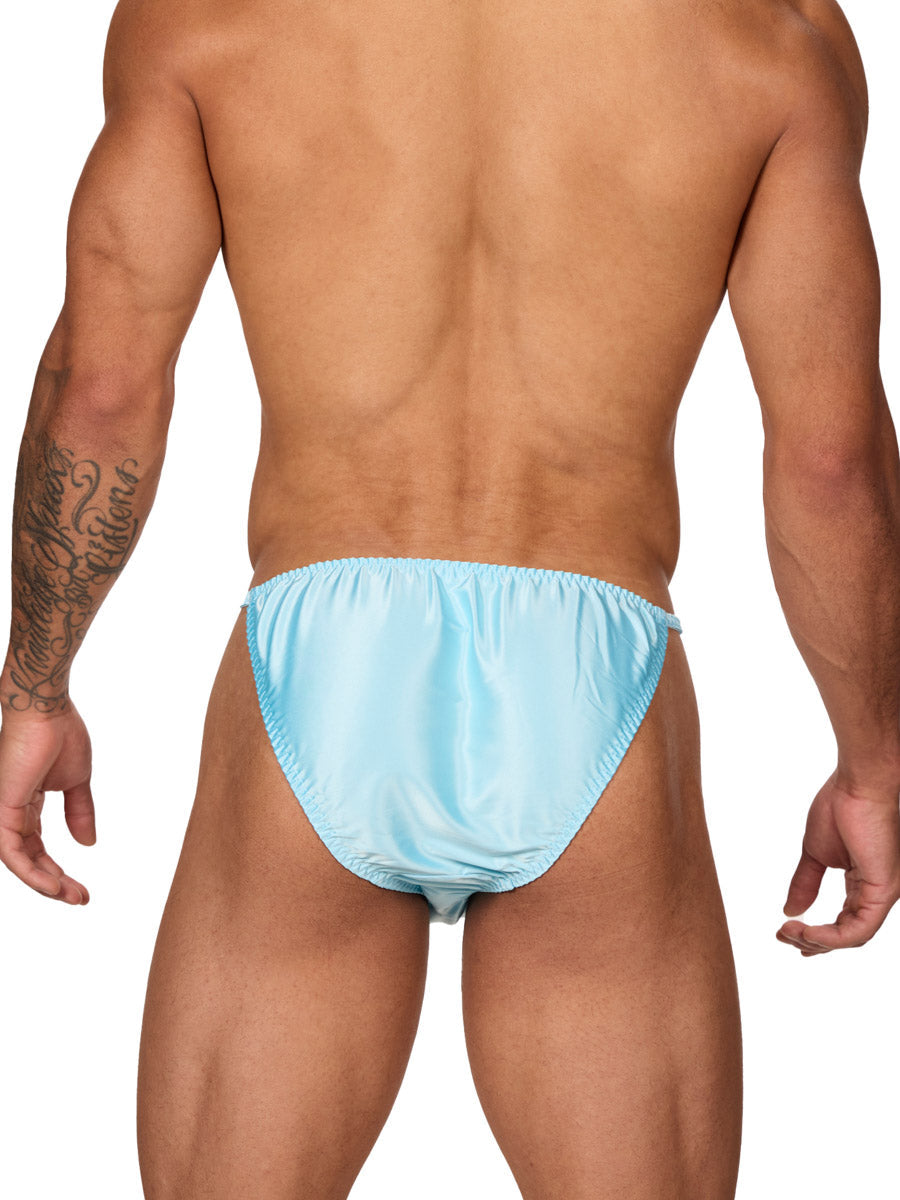 Back view of a male model wearing an XDress sky blue men's bikini brief