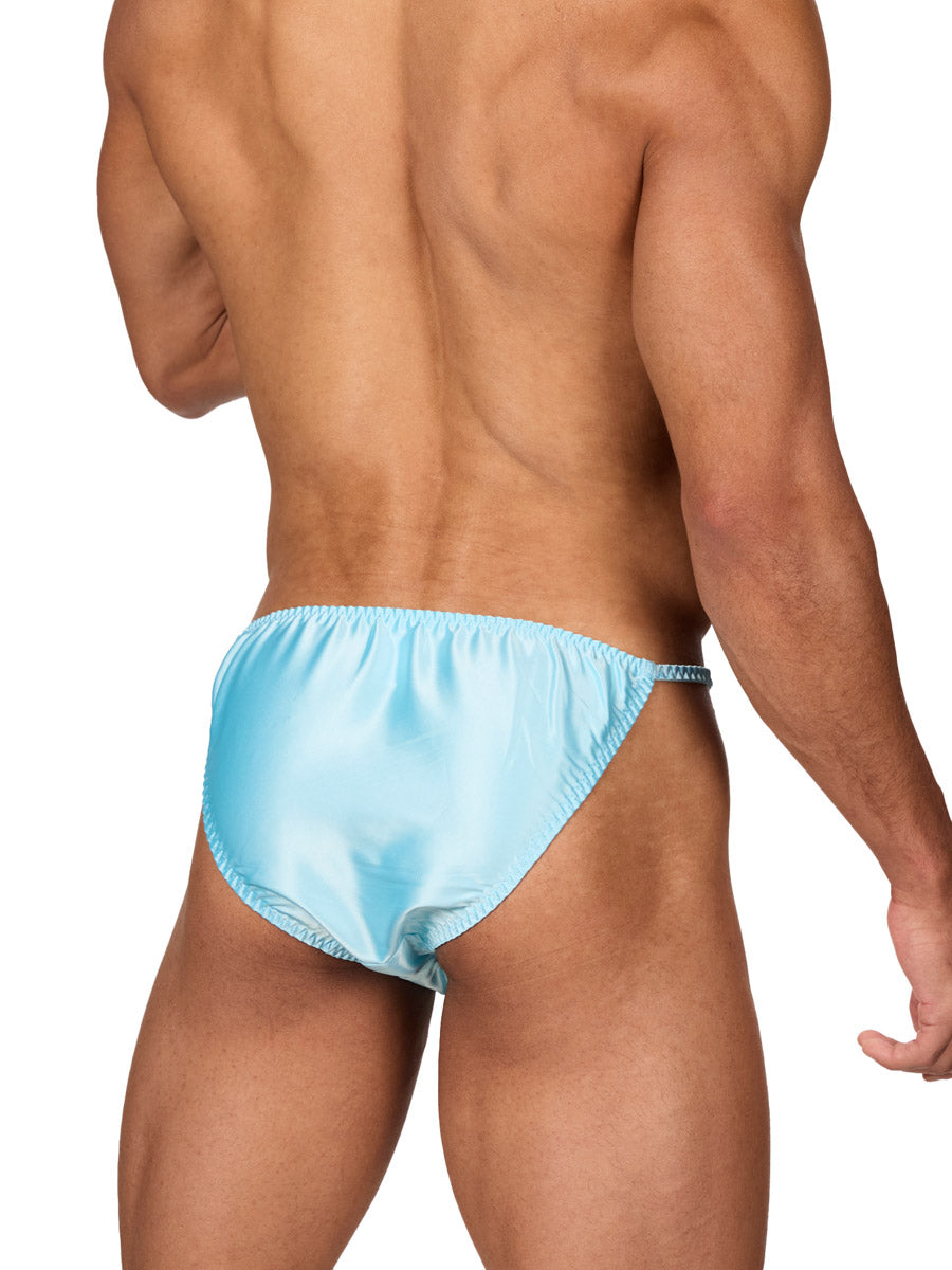 Back view of a male model wearing an XDress sky blue men's bikini brief