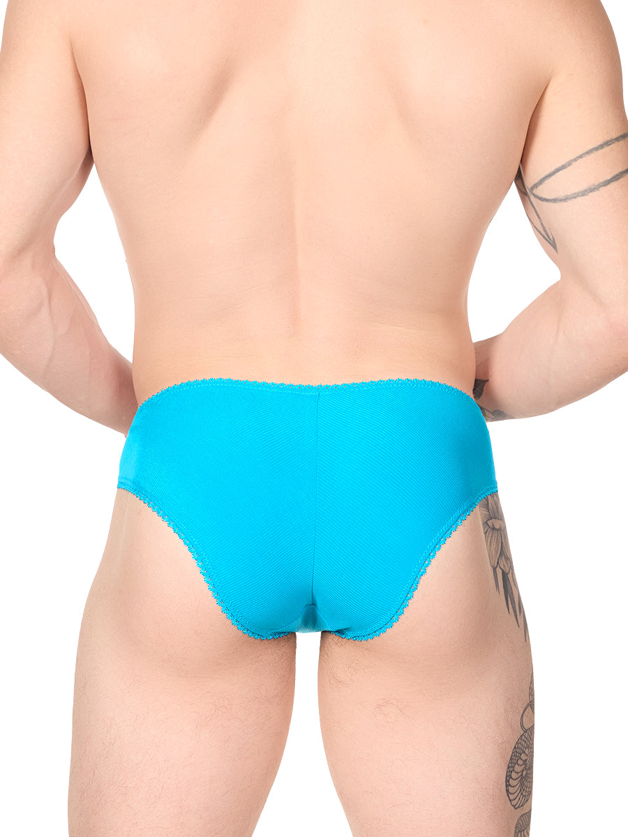 Back view of a man wearing a turquoise XDress panty with lace trim