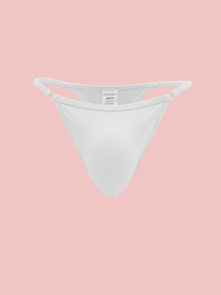 A white men's thong panty on a pink background.