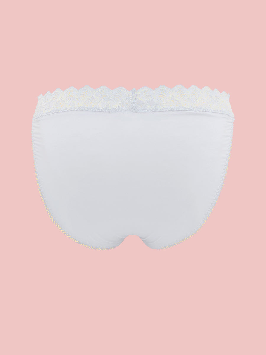 White men's panties with lace trim on a pink background.