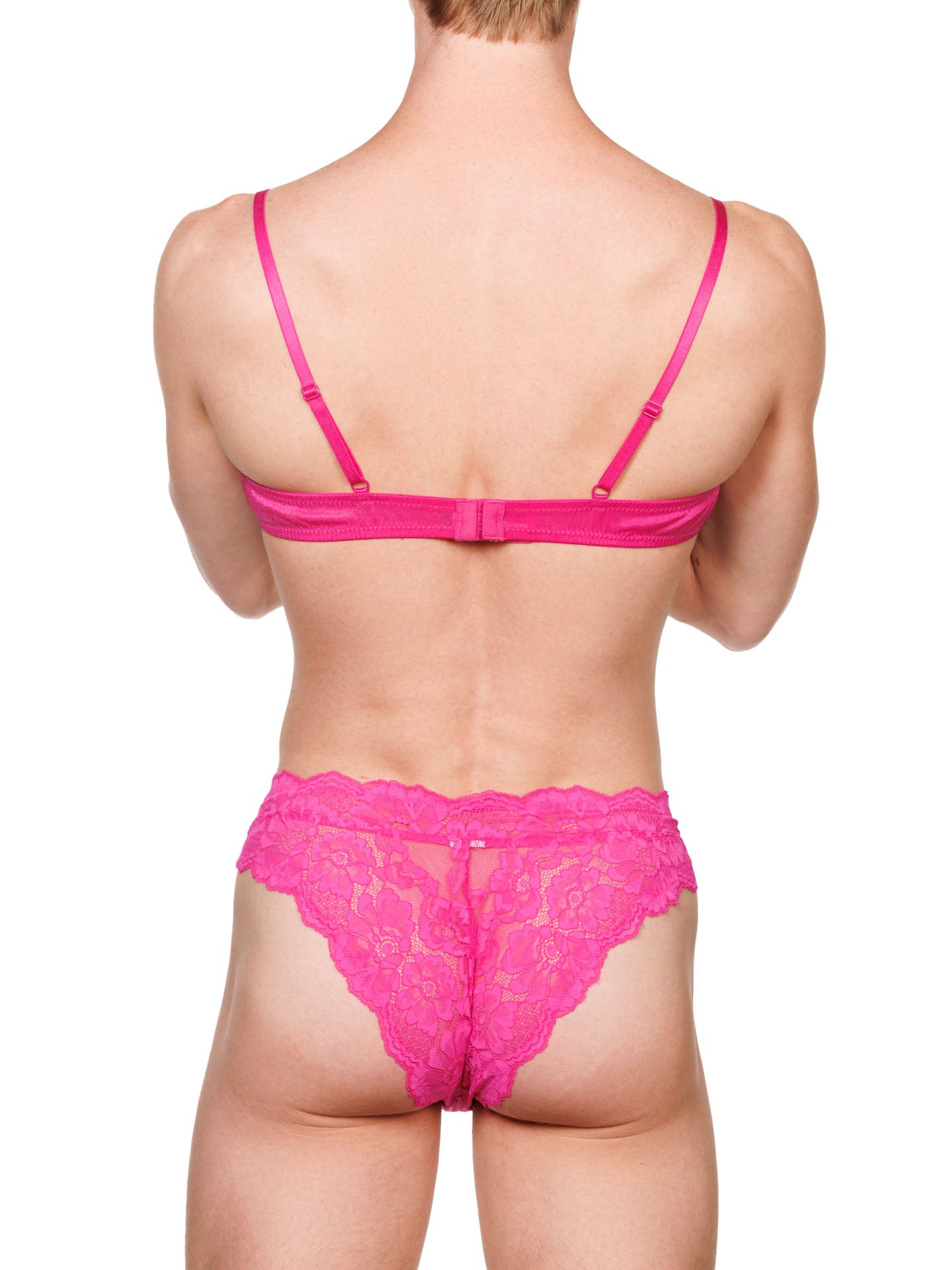 Back view of a male model wearing a matching XDress pink bra & panty set