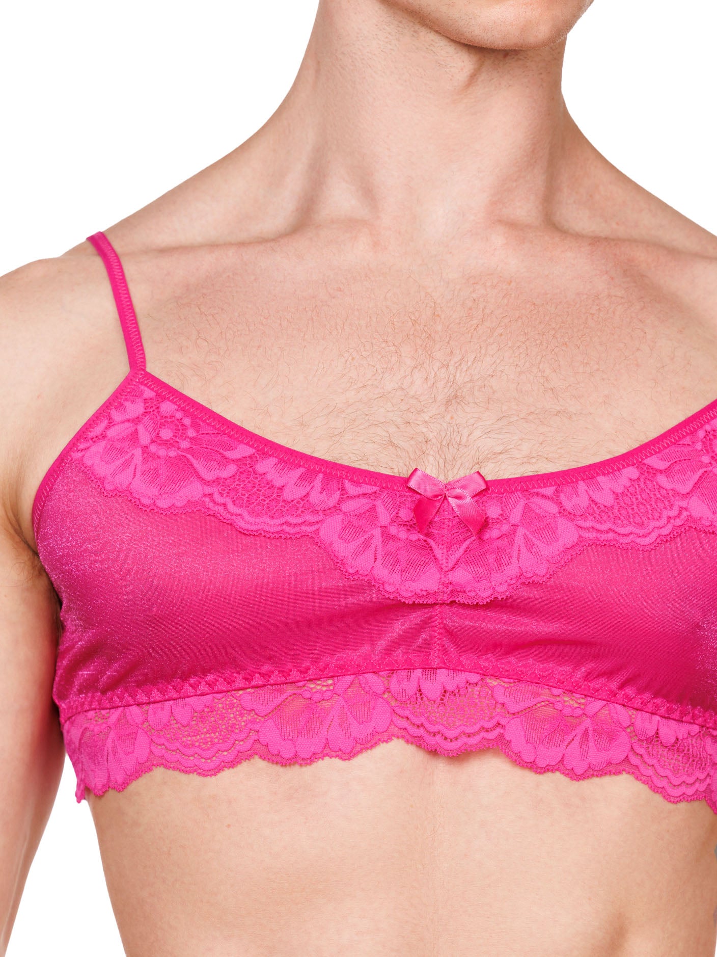 Closeup view of a male model wearing a pink XDress bralette