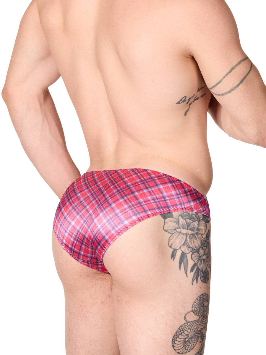 side view of a man wearing pink plaid XDress satin panties