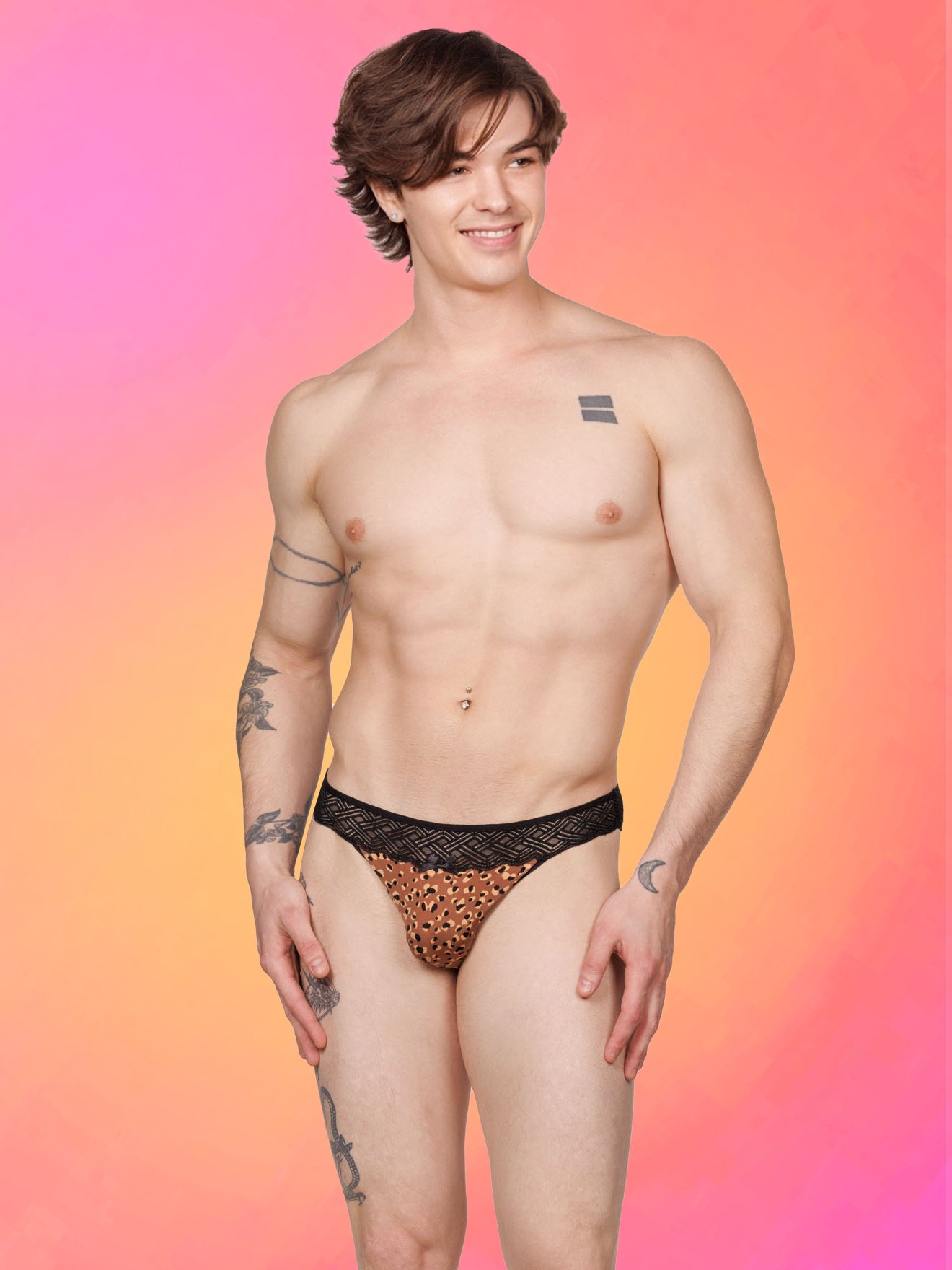 Front view of a male model wearing XDress lace panties with leopard print pattern