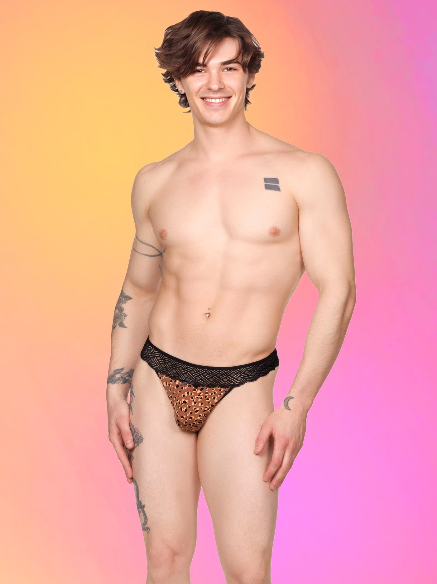 Front view of a male model wearing an XDress lace thong with leopard print pattern