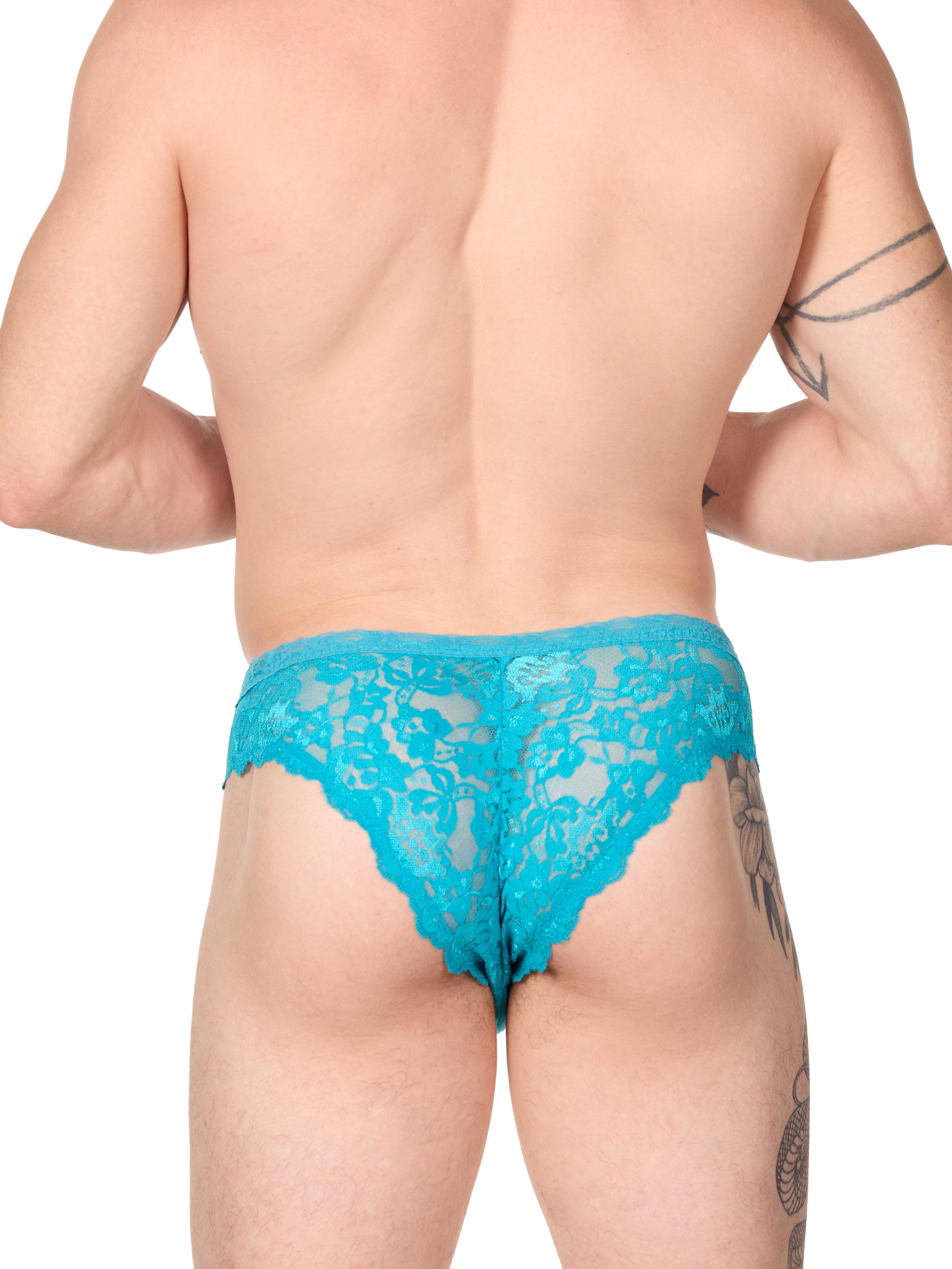 back view of man wearing XDress turquoise blue lacey panties