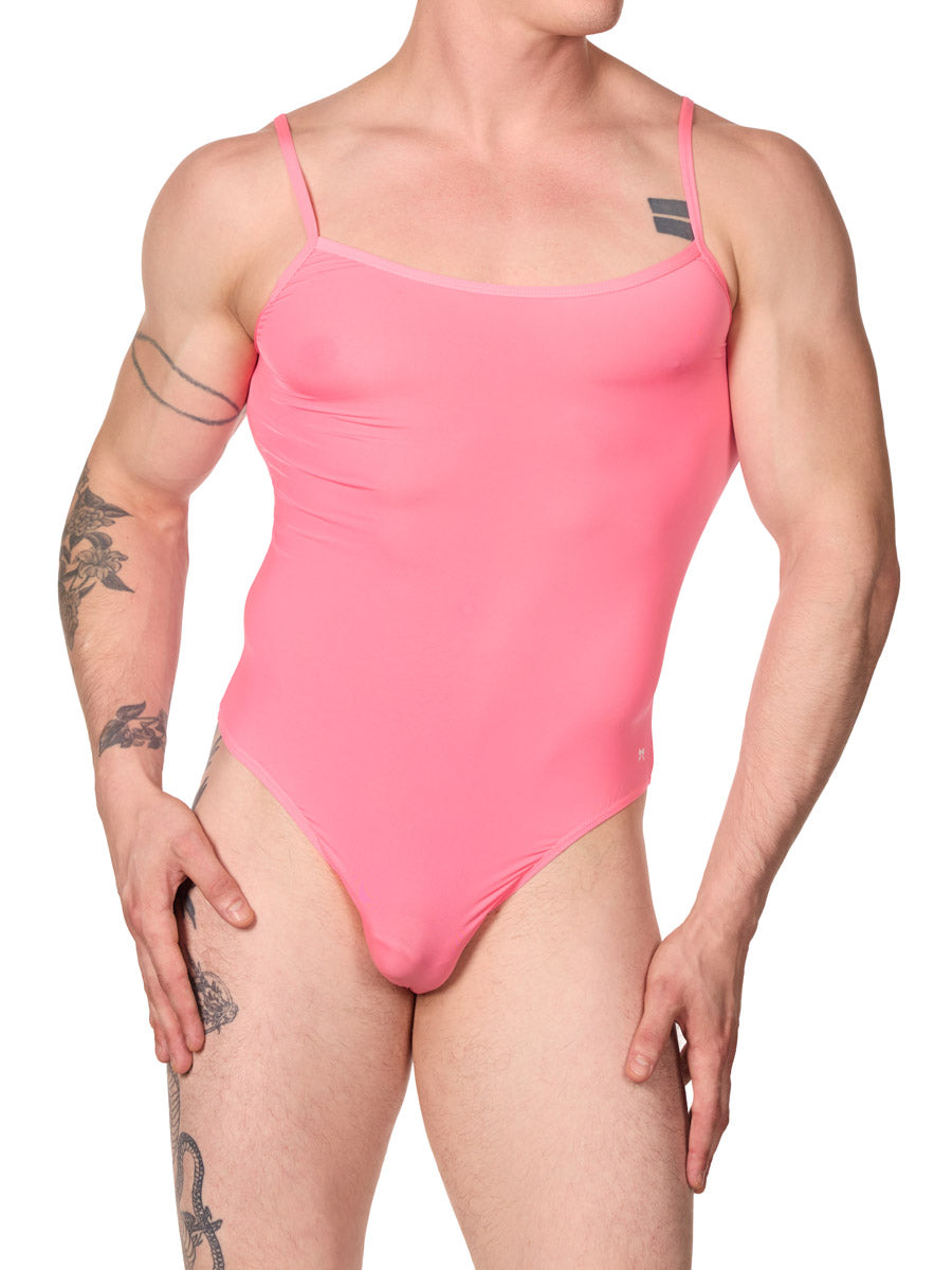 front view of man in an XDress pink thong bodysuit