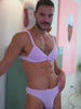 Video of a man posing in a matching purple bra and panty set from XDress